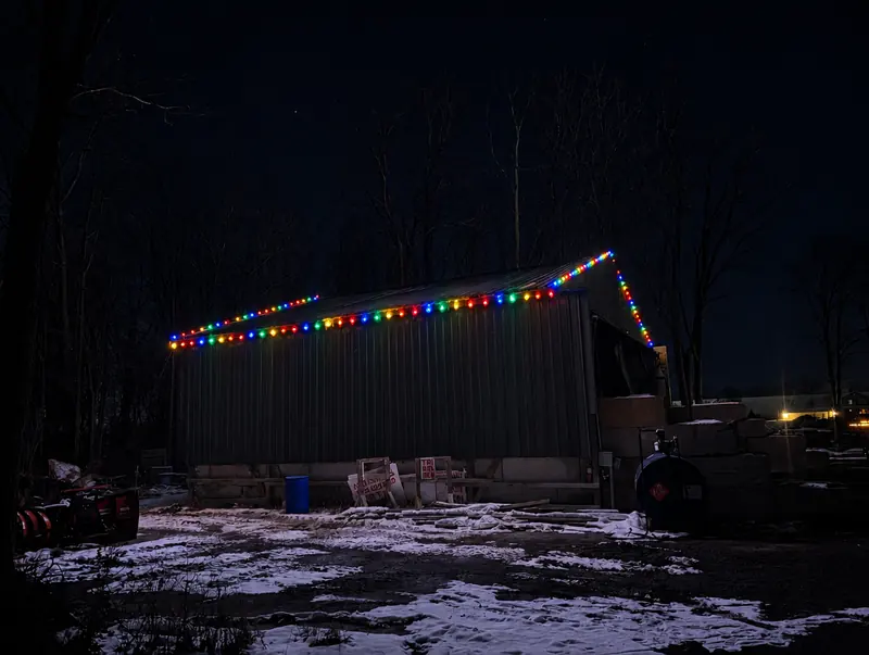 Garage building with multicolor roofline lights